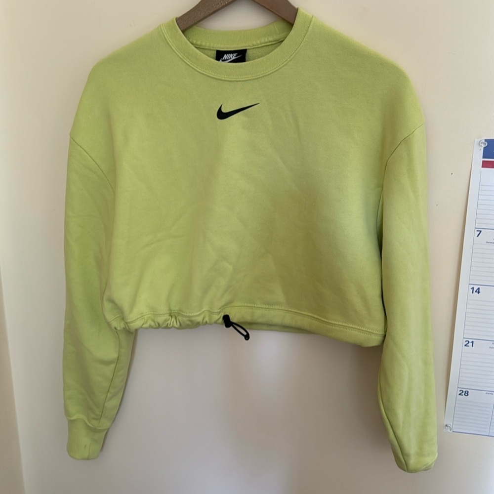 Nike sweatshirt. Adjustable drawstring. Size small. Cropped.